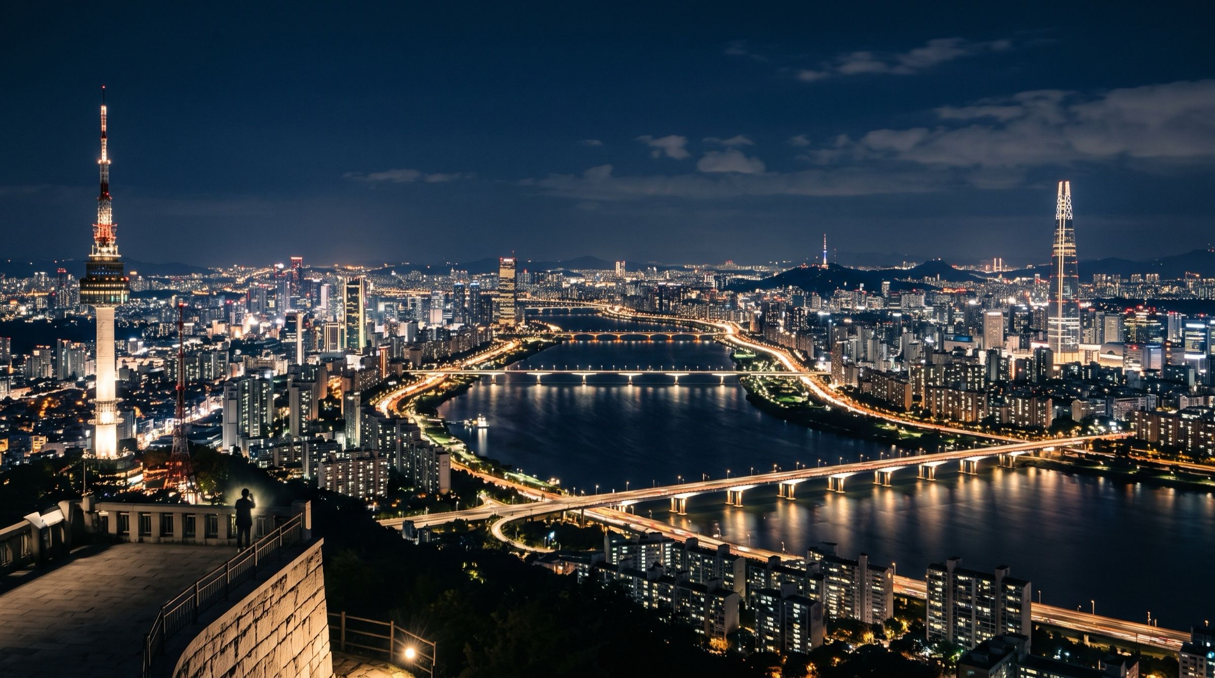 Seoul skyline at night from Namsan with the Han river and city lights