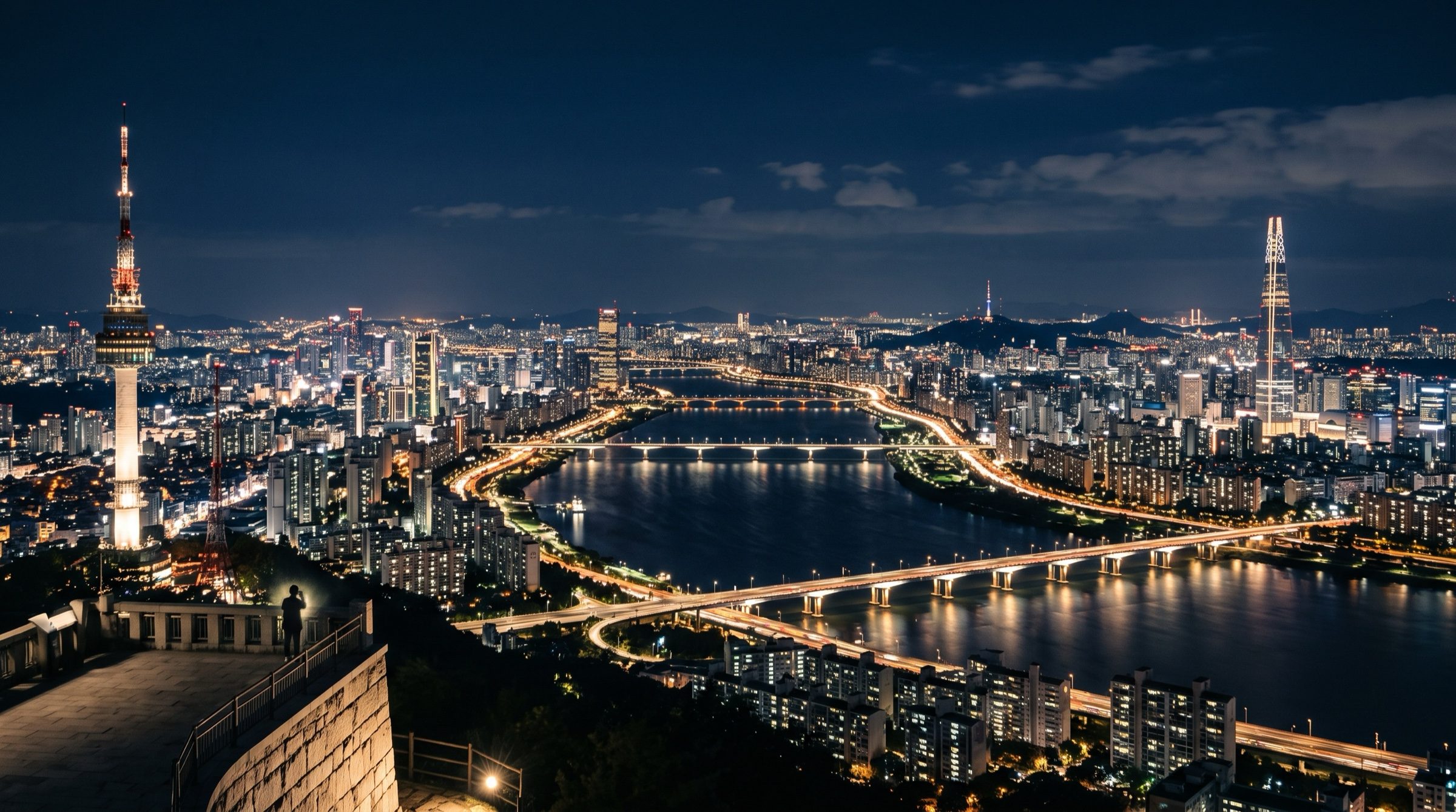 Seoul skyline at night from Namsan with the Han river and city lights
