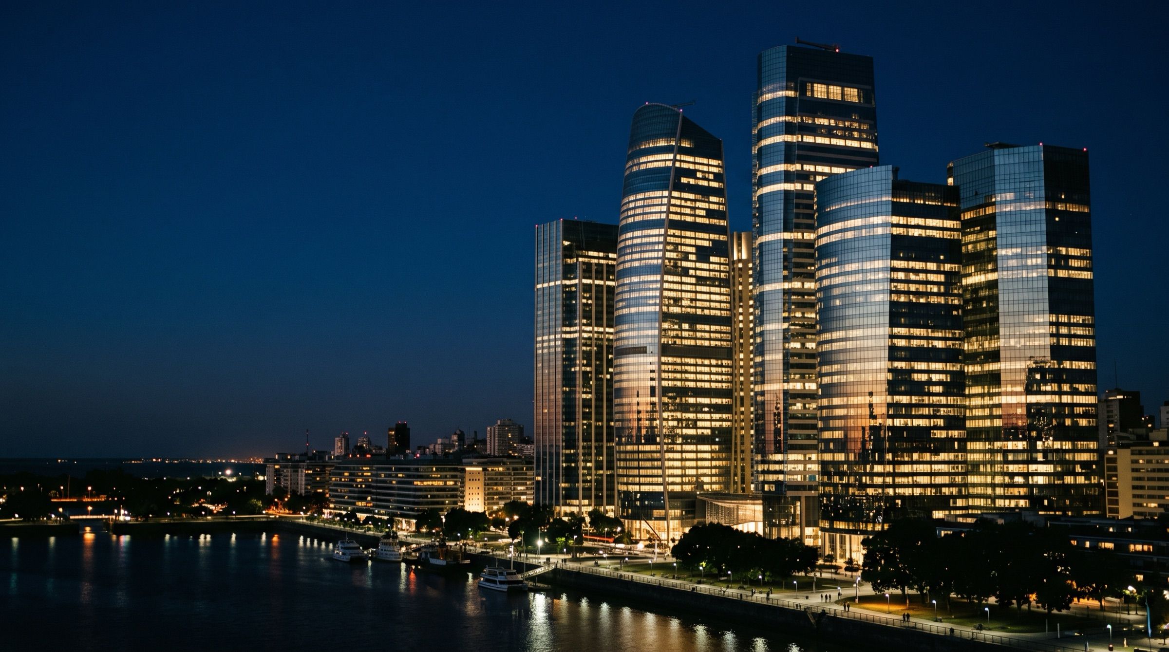 The Catalinas financial towers of Buenos Aires at dusk with lit office windows