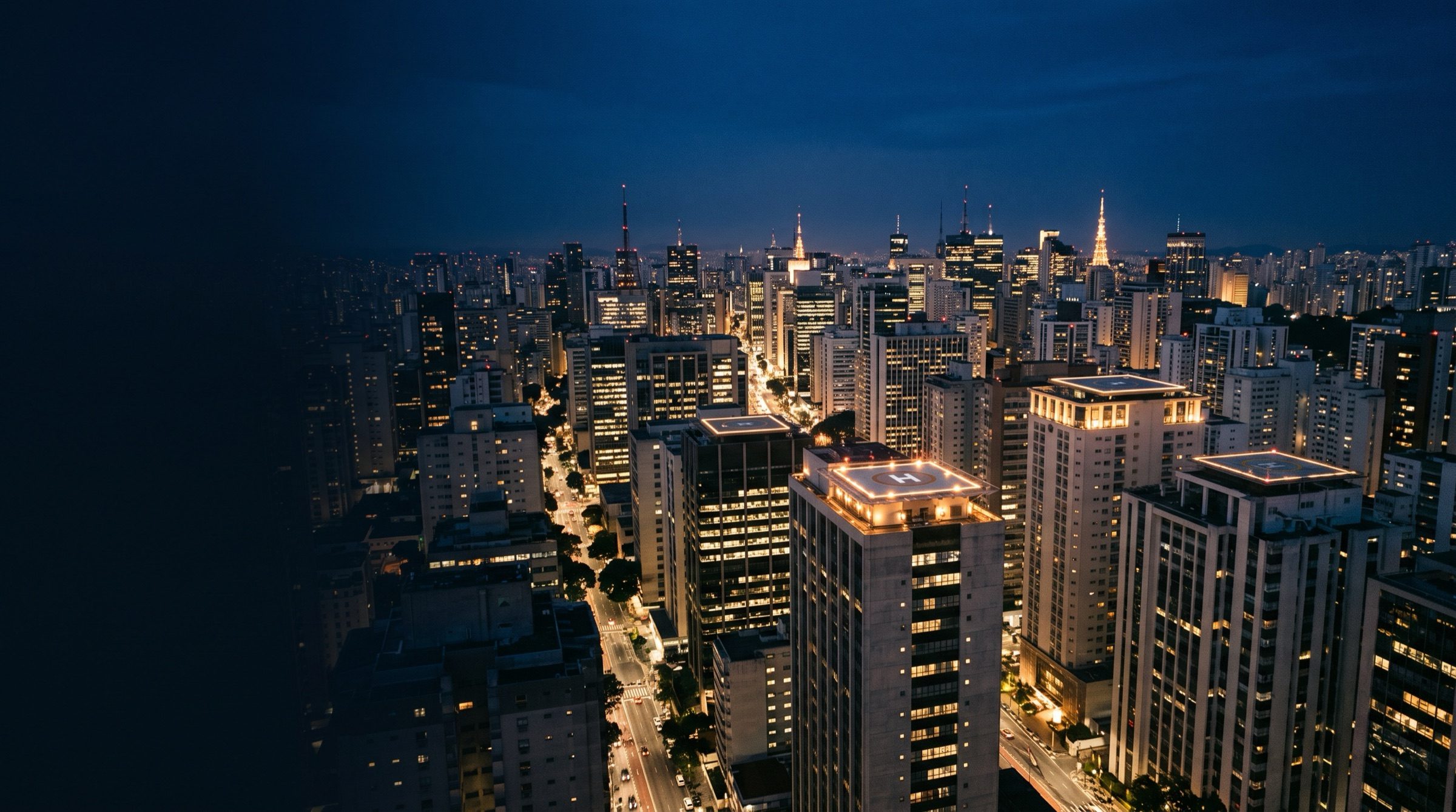 The Sao Paulo skyline at blue hour, dense towers, rooftop helipads with lights