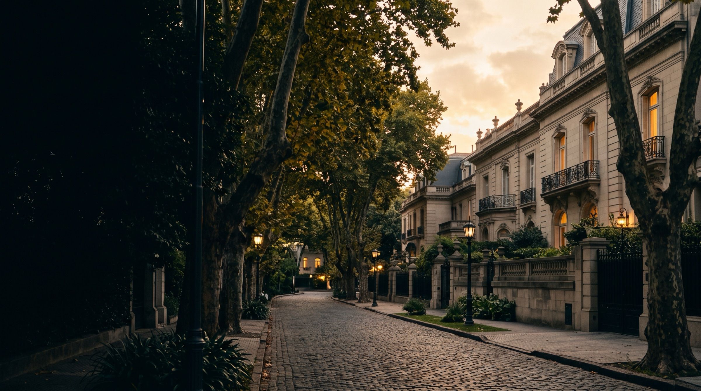 A quiet street of grand mansions and plane trees in Palermo Chico, Buenos Aires at golden hour